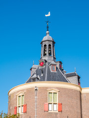 Wall Mural - Top of Drommedaris gate in harbour of city of Enkhuizen, North Holland, Netherlands