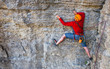 © zhukovvvlad - Climber in a helmet climbs up.