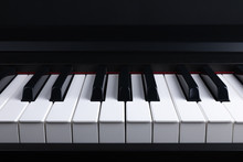 Grand Piano Keyboard With Glossy Black And White Keys As A Music, Select Focus And Soft Focus.