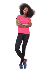full body happy african american sports woman standing against isolated white background