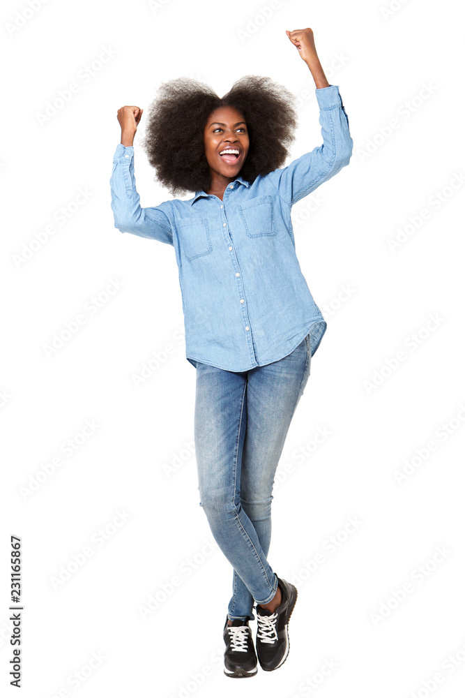 Full length happy young woman cheering with hands raised Stock Photo ...