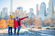 © travnikovstudio - Family of father and kids in Central Park during their vacation in New York City