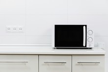 Modern Kitchen Interior With Electric And Microwave Oven