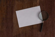 blank paper ready for note , with agnifying glass
