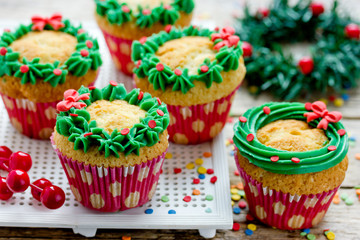 Christmas wreath cupcakes -  beautiful and delicious homemade cupcakes decorated with green cream and candy sprinkles, Christmas and New Year dessert