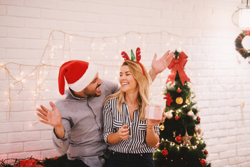 Wall Mural - Happy family christmas eve. Christmas friends.