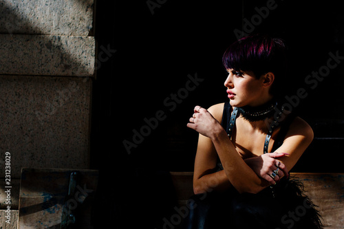 Portrait Of An Attractive Woman With Short Purple Hair And
