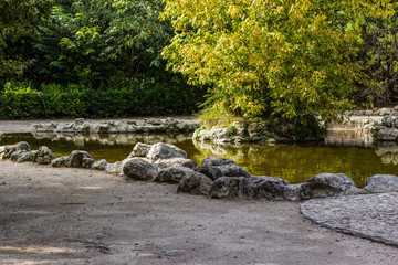 Wall Mural - outdoor park space for walking and rest with small lake and island