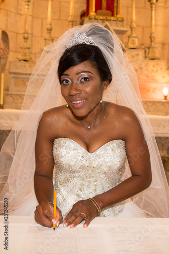 Elegant African American Black Bride Who Signs The Register During