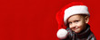 © FAB.1 - Funny smiling joyful child boy in Santa red hat