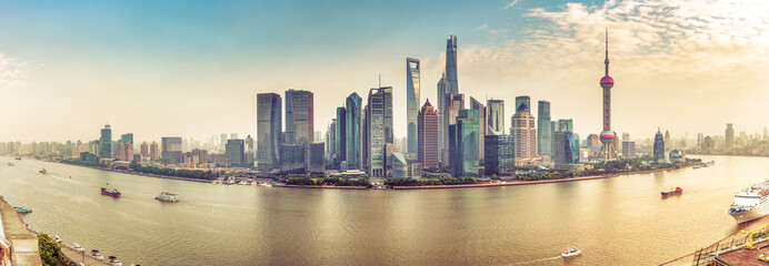 Wall Mural - Aerial panorama view on Shanghai, China. Beautiful daytime skyline with skyscrapers and the Hunapu river.