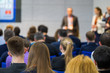 © Anton Gvozdikov - People attend business conference in the congress hall
