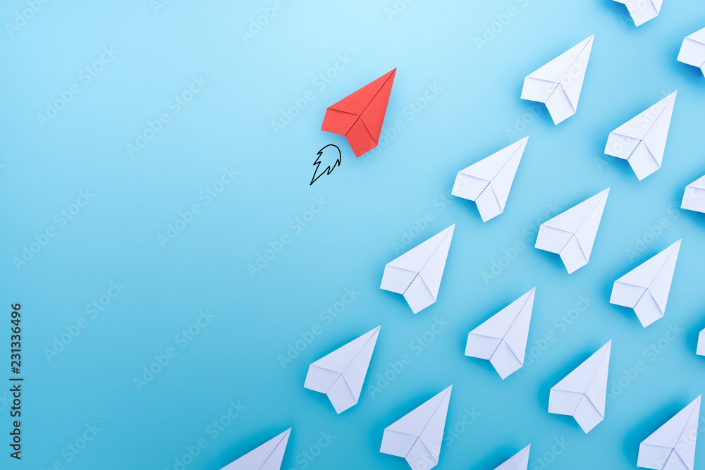 Red paper plane are different from others on blue background. Think different. Business for innovative, solution concepts. - obrazy, fototapety, plakaty 