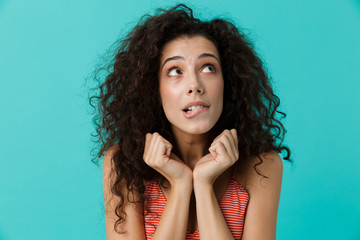 Poster - Image of pretty woman 20s wearing casual clothing laughing, standing isolated over blue background