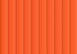 Colorful background consisting of orange rectangle in a row next to each other. Mosaic of geometric elements. Orange vertical louver of parts 