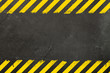 Concrete background with grunge hazard sign