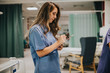 © Rawpixel.com - Young female nurse taking notes