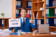 © Elnur - Young employee working in the office
