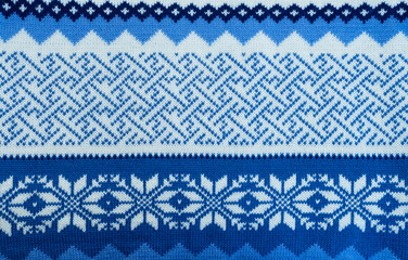 Pattern texture of blue and white winter sweater background