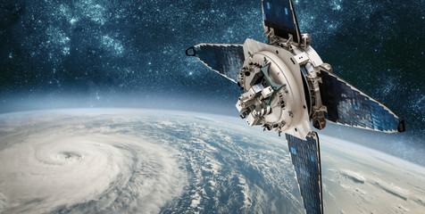 Wall Mural - space satellite monitoring from earth orbit weather from space, hurricane, typhoon on planet earth.