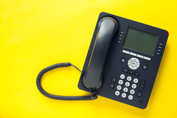 deskphone, office and business concept. new ip phone with buttons and big display for communication 