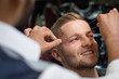 © serhiibobyk - Closeup of process of threading procedure in barber shop