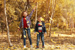© New Africa - Cute little children having fun in park. Autumn walk
