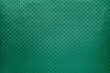 © nikol85 - Green background from metal foil paper with a stars pattern