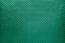 Green Background From Metal Foil Paper With A Stars Pattern