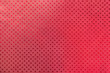 Red background from metal foil paper with a stars pattern