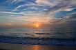 © sue - sunset on the beach with warm breezes and waves on the gulf coast