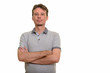 © Ranta Images - Handsome Caucasian man looking at camera with arms crossed