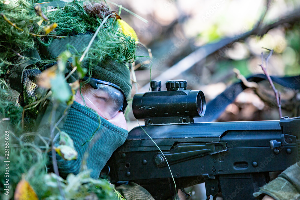 special forces, soldier assault rifle with silencer, optical sight ...