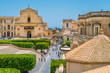Scenic view in Noto, with the Santissimo Salvatore Church and the Palazzo Ducezio. Province of Siracusa, Sicily, Italy.
