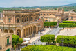 Panoramic view in Noto, with the Palazzo Ducezio and the Church of San Carlo. Province of Siracusa, Sicily, Italy.