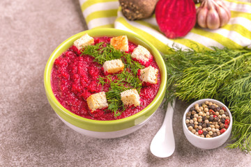 Wall Mural - Bright tasty pureed beetroot soup with ingredients. Healthy food