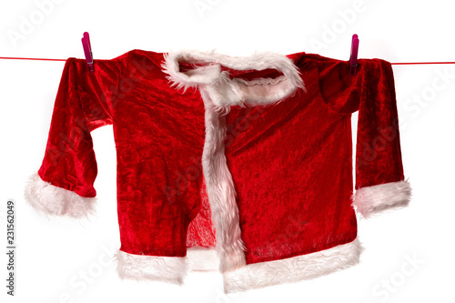 Cuadros en Lienzo le manteau rouge du père noël suspendu à un fil