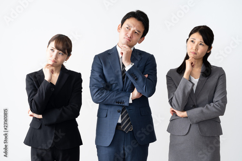 Fotografía portrait of asian businessgroup thinking on white background