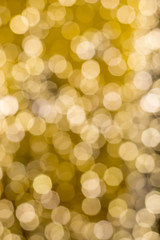 Wall Mural - blurred background of light gold bokeh