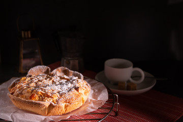 Poster - homemade almond frangipane cake in selective lighting