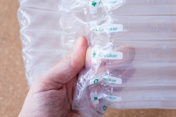 translucent air packaging hands hold, plastic packaging