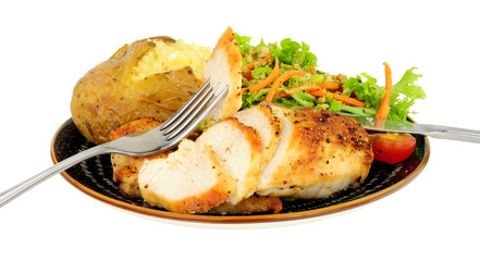 Wall Mural - Chicken and baked potato meal with fresh salad isolated on a white background