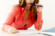 © Delete - Sexy secretary sitting on desk reading documents, seduction