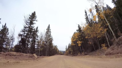Aufkleber - Time lapse. Driving on small mountain dirt roads from Colorado Springs to Cripple Creek in Autumn.