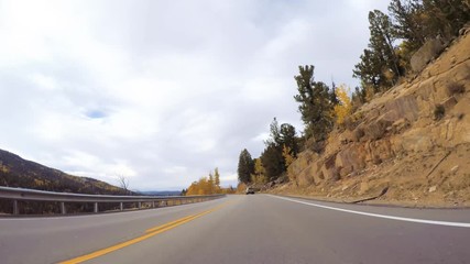 Sticker - Driving on mountain highway 67 to Colorado Springs in Autumn.