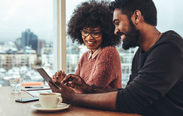 Business partners working in office together