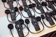 Headphones Used For Simultaneous Translation Equipment Simultaneous Interpretation Equipment . A Set Of Headphones For Simultaneous Translation During Negotiations In Foreign Languages.