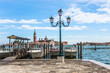 Gondola and boats molo in Venice
