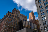 Fototapeta Miasto - New York City / USA - OCT 24 2018: Residence building in lower Manhattan against clear blue sky