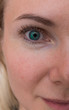 © AndErsoN - Macro shot of blue woman's eye with clear makeup